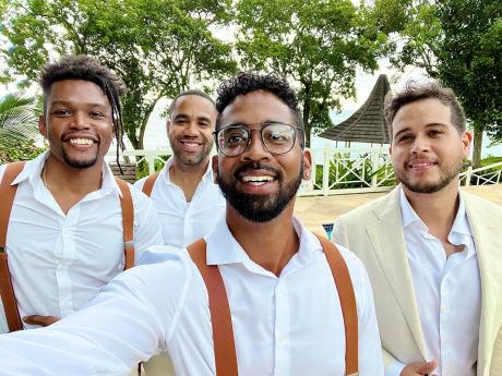 Credit: Contributed Scotch Boyz’s Matthew Wallace (front) snaps a selfie with his partners (from left) Kemar Swaby, Neil Hudson and Drew Gray during Gray’s wedding.