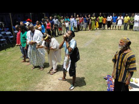 Credit: Contributed People participating in a Taino ancestral ritual at the Charles Town International Maroon Conference and Festival in 2018.