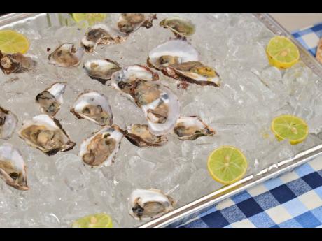  Jacqui Tyson served chilled oysters on ice. 