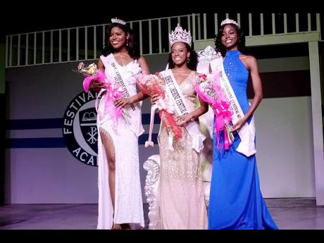 Credit: Anthony Minott Newly crowned Miss St Catherine Festival Queen Aundrene Cameron (centre) is sandwiched by first runner-up Toni Woodburn (left) and Sadara-Ahindi Dyer, second runner-up.