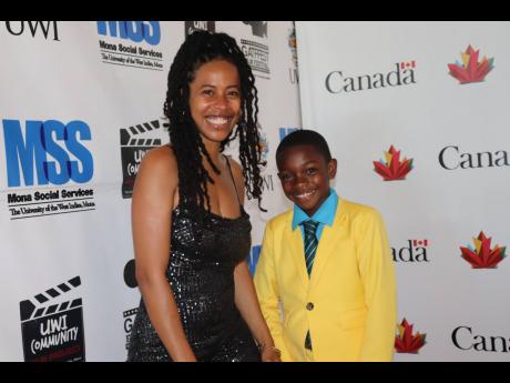 Associate producer and acting coach on the film, Donisha Prendergast, and Djamari Roberts were thrilled to see each other at the premiere.