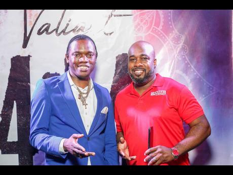 Valiant (left), shares a moment with Mark Telfer, brand manager, Campari at the launch of ‘4:14’. 