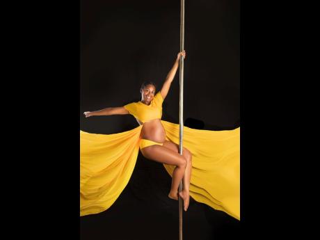 Poling pregnant, Instructor Christina Evans would teach alongside an assistant who demonstrated the moves that were difficult to execute.