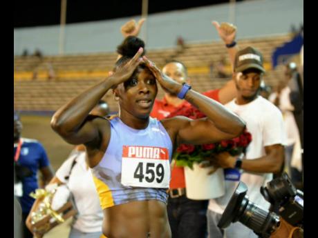 Shericka Jackson tries to process the massive personal best, 10.65 seconds, she ran at the JAAA/PUMA National Senior and Junior Championships inside the National Stadium this evening.