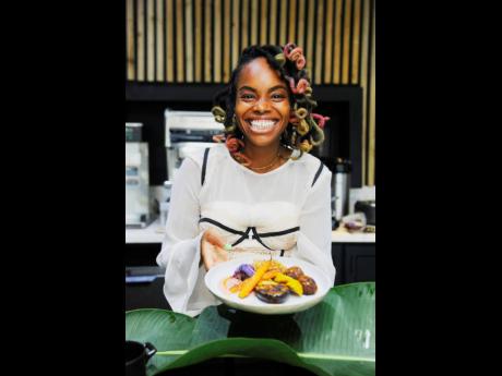 Credit: Nicholas Nunes/Photographer Serving up her famous babe bowl, The Plantry Queen Danielle Terrelonge is all smiles.