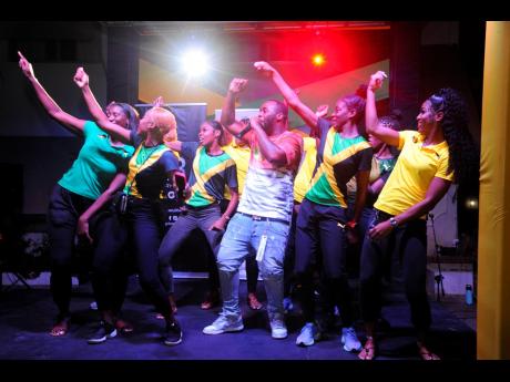 The Sunshine Girls dancing at their send-off party at the Summit House (formerly Knutsford Court Hotel), in New Kingston on July 11.