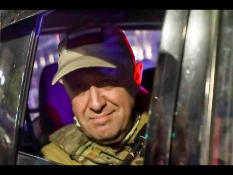 Yevgeny Prigozhin, the owner of the Wagner Group military company, looks from a military vehicle leaving an area of the HQ of the Southern Military District in a street in Rostov-on-Don, Russia, on June 24. 