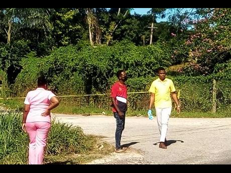 Credit: Hopeton Bucknor File photo shows Scene of Crime detectives carrying out investigations in the area where the body of nine-year-old Gabriel King was found in St James.