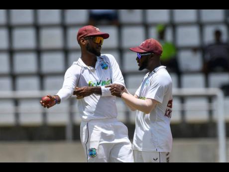 West Indies captain Kraigg Brathwaite, has a chat with his vice captain, Jermaine Blackwood during a Test match against India at Windsor Park in Dominica last week.