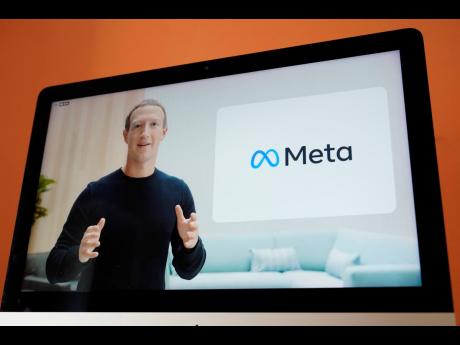 Meta Platforms CEO Mark Zuckerberg is seen on the screen of a device.