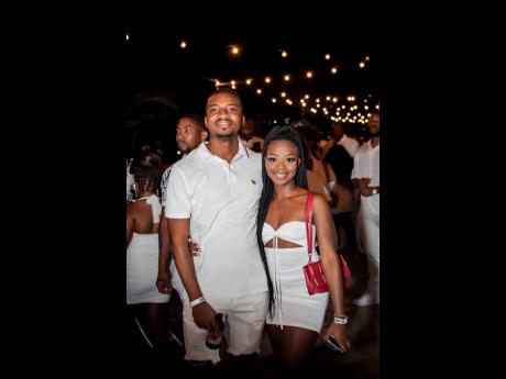 Bright smiles and fairy lights were the vibe for the Reggae Sumfest All–White party. Arnaldo Martin, Red Stripe’s junior brand manager, and Hanna Turner, Red Stripe marketing intern, stuck to the designated shade. 