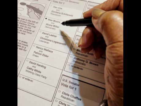 Wes Moore’s grandmother, Winell Thomas, casts her vote for him to become the governor of the state of Maryland last year.  