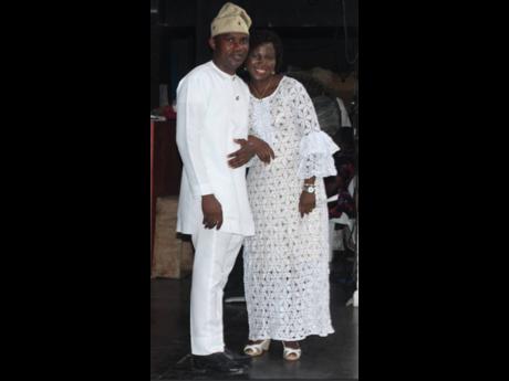 Mr and Mrs Ibkunle Israel are resplendent in white during the onstage fashion show. 