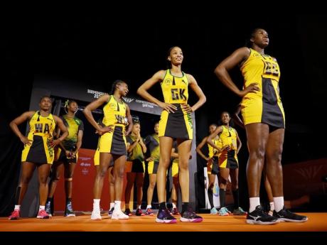 Credit: Courtesy of birmingham2022.com Jamaica’s Sunshine Girls walk on to the court during the netball gold medal match against Australia on day 10 of the Birmingham 2022 Commonwealth Games at NEC Arena on August 7, 2022, in Birmingham, England.