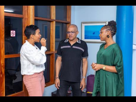 From left: Nicole McLaren Campbell, CEO of AIM Online Academy, Dr Michael Abrahams, obstetrician and gynaecologist, comedian and poet and Krystal Tomlinson, author, public speaking and self-management coach keep the conversation about social and economic t