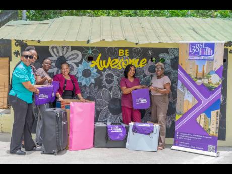 During a recent tour of Sophie’s Place in Gordon Town, a team from 138 Student Living Jamaica Limited presented gifts for the wards of the facility, including for those with special needs between ages two and 24. Donations included clothing, linen and to