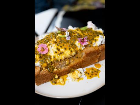 Credit: Contributed Worthy Park 12-year-old is served with a coconut cake topped with passion fruit and drizzled with turmeric honey coulis.