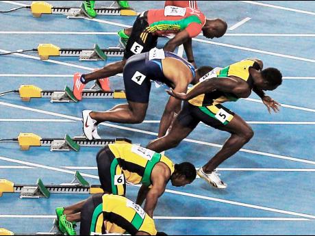 In this Sunday, August 28, 2011 file photo, Jamaica’s Usain Bolt, third from bottom, false starts from the men’s 100-metre final at the World Athletics Championships in Daegu, South Korea.  AP