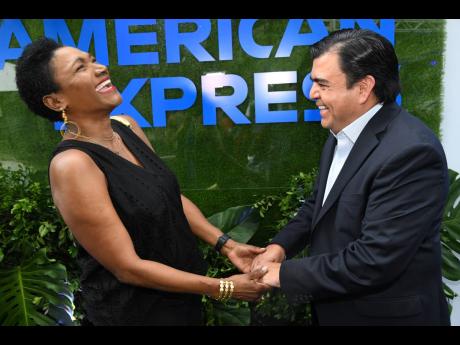 Audrey Tugwell Henry, president and chief executive officer of Scotia Group Jamaica, shares a moment with Mario Luna, commercial vice-president of partnerships, Banks of American Express, Mexico, Central America and the Caribbean, at the Scotiabank x Ameri