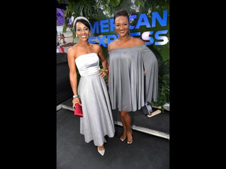 Platinum girls Angelie Spencer (left), principal and interior decorator, Angelie Spencer Home, and parenting consultant Michelle Gordon of Boss Mom Network shimmer in metalic hues reminiscent of the newly introduced AMEX card.