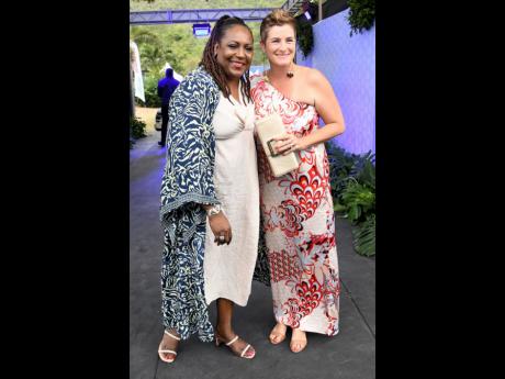 Dr Tamra Morris (left) and Debra Lopez-Spence, president, Scotia Jamaica Life Insurance Company Limited, show off their peak summer style.