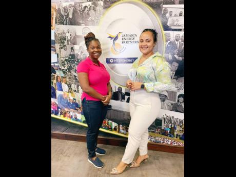 Ranee Anderson with Melissa Newman, director of corporate affairs and marketing from Jamaica Energy Partners.
