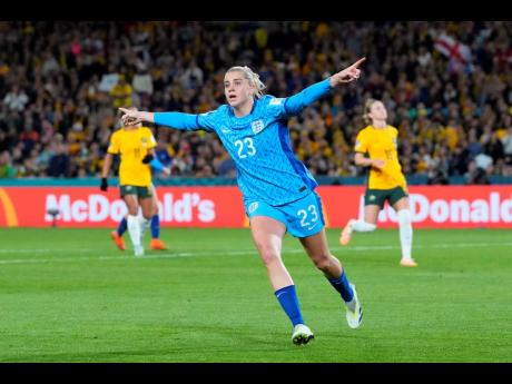 England’s Alessia Russo celebrates after scoring her side’s third goal during the Women’s World Cup semifinal football match against Australia at Stadium Australia in Sydney, Australia yesterday.