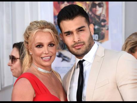  Britney Spears (left) and Sam Asghari.