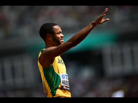 Jamaica's Andrew Hudson salutes the crowd after successful qualification to the semi-final round of the men's 200 metres at the World Athletics Championships in Budapest, Hungary.