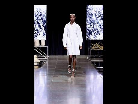 SAINT International’s Jamaican model Nickosha Arnold-Johansen, a longtime resident of Norway, in Look 17 from Norwegian label Woodling’s Spring/Summer 2024 collection that heavily featured linen sets and tucked silk dresses.