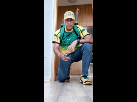 Credit: Janet Silvera Locked and loaded ... Robert Richards gets ready to go on a scooter in Budapest.