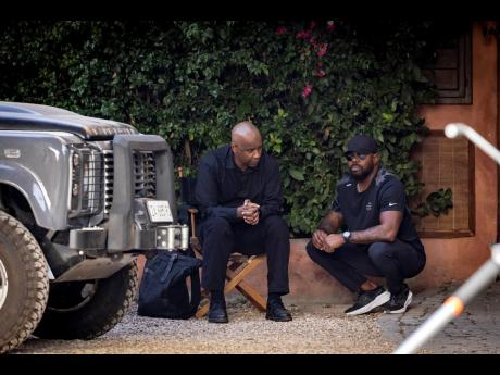 Denzel Washington (left) and director Antoine Fuqua on the set of ‘The Equalizer 3’.