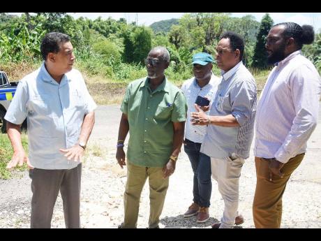 From left: Homer Davis, minister of state in the Office of the Prime Minister - West; Local Government Minister Desmond McKenzie; Everest Coke, councillor for the Maroon Town division in the St James Municipal Corporation (StJMC); Dwight Wilson, technical 