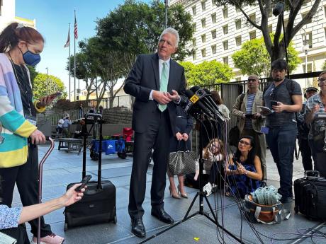 Deputy District Attorney Reinhold Mueller speaks during a press conference after the sentencing of actor Danny Masterson on Thursday, in Los Angeles.