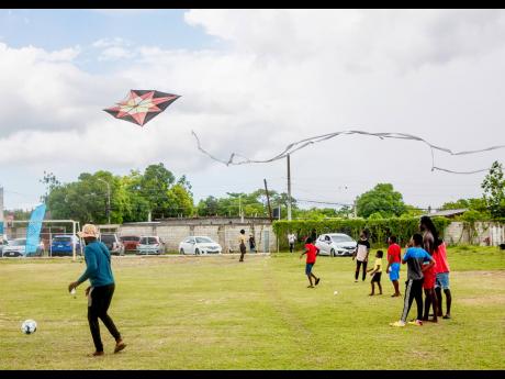 Residents enjoying the kite festival.