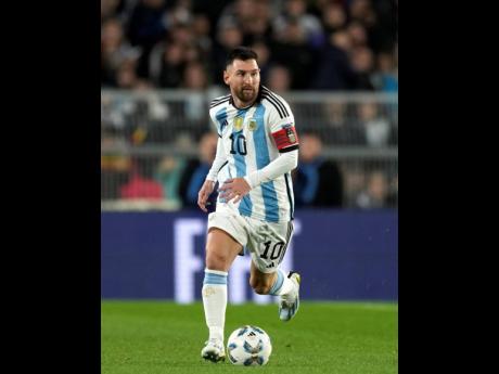 Argentina’s Lionel Messi runs with the ball during a qualifying  match against Ecuador for the FIFA World Cup 2026, at Monumental stadium in Buenos Aires, Argentina on Thursday, September 7, 2023. 