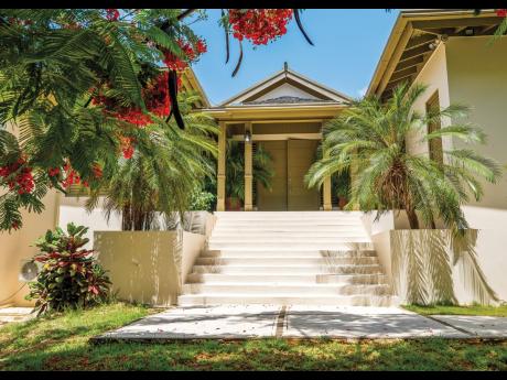Contributed Photos
The entrance makes a grand tropical statement.