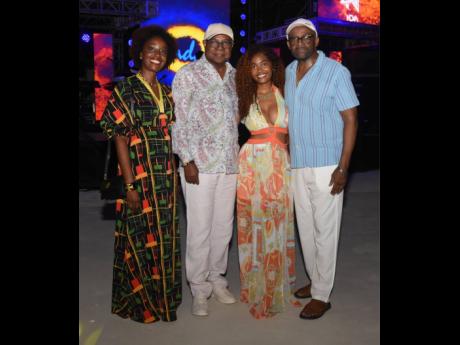 Partying in prints are (from left) Nadine Spence, chairman, Jamaica Hotel and Tourist Association-Montego Bay Chapter; Edmund Bartlett, minister of tourism; Nahdira Spence; and Donovan White, director of tourism.