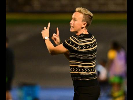 
Canada’s coach Beverley Priestman directs her charges during an Olympic qualification tie against Jamaica at the National Stadium on Friday.