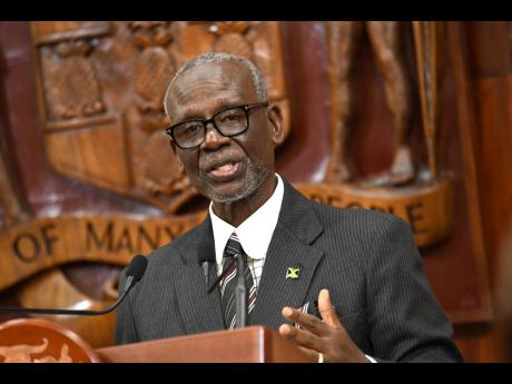 Desmond McKenzie, minister of local government and rural development. 