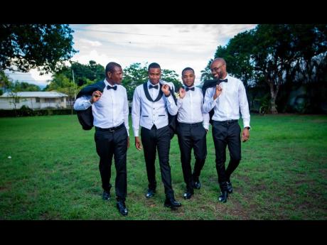 Credit: Contributed The groom, Andre Williams (second left), is flanked by his groomsmen (from left) Osbourne Williams, Delano Anderson and Evan Cameron.