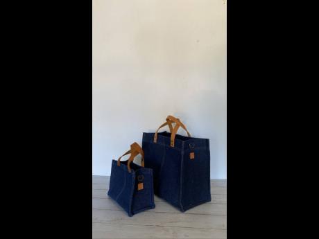 Credit: Contributed The TK denim tote is a timeless bag with a chic modern twist.