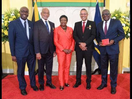 From left: Gary Allen, chief executive officer of the RJRGLEANER Communications Group;  Douglas Orane, former executive chairman of GraceKennedy Group; Minna Israel, board member, Mona School of Business & Management (MSBM); Christopher Barnes, chief strat