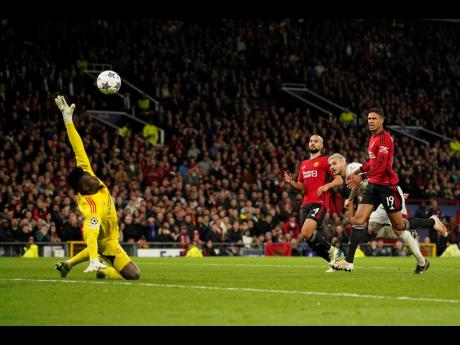 Credit: AP Galatasaray’s Mauro Icardi (second right) scores his side’s third goal during their Champions League Group A football match at the Old Trafford stadium in Manchester, England, yesterday.