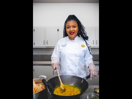 Sabrina McDonald, the chef, cooks up a storm using her City Eats curry powder.