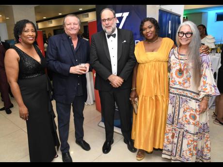 Familiar faces were spotted on this night of celebration. From left: Tanikie McClarthy Allen, senior director, public affairs and sustainability, J. Wray and Nephew Limited; Jean-Philippe Beyer, managing director of J. Wray & Nephew Limited; Mark Golding, 