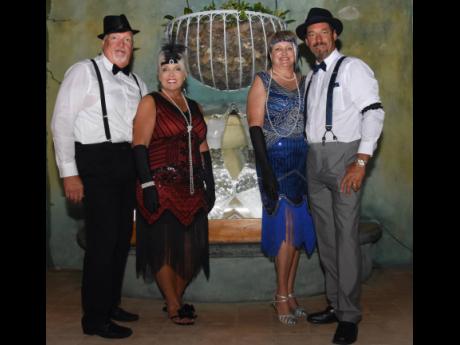 Dressed in 1920s style are (from left) Steve Steadman, Terri Christian, and Jennfier and Greg Lowe. 