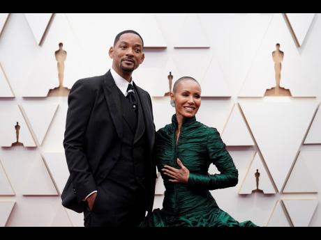 Jada Pinkett Smith (right), and husband, Will Smith. 