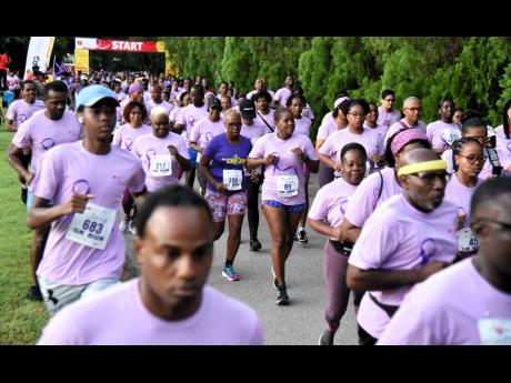 The start of the CIBC First Caribbean 2023 Walk For The Cure 5K at Hope Gardens in St Andrew yesterday morning.