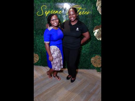 Monae Williams from Northern Caribbean University (NCU) (left)  with Chloleen Daley-Muschett, corporate communications and PR manager of Supreme Ventures Limited.
